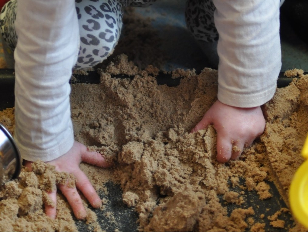 wet sand play for sensory play